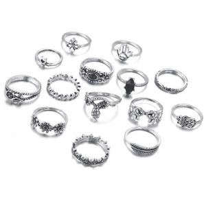 Ring Stacking Mastery: Styling Statement Boho Rings with Delicate Midi Rings